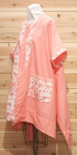 Peach shibori linen cloak with 2 large front pockets.