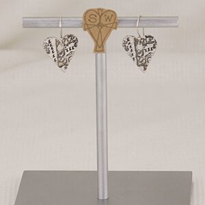 Handmade sterling silver heart earrings with artistic imprints.