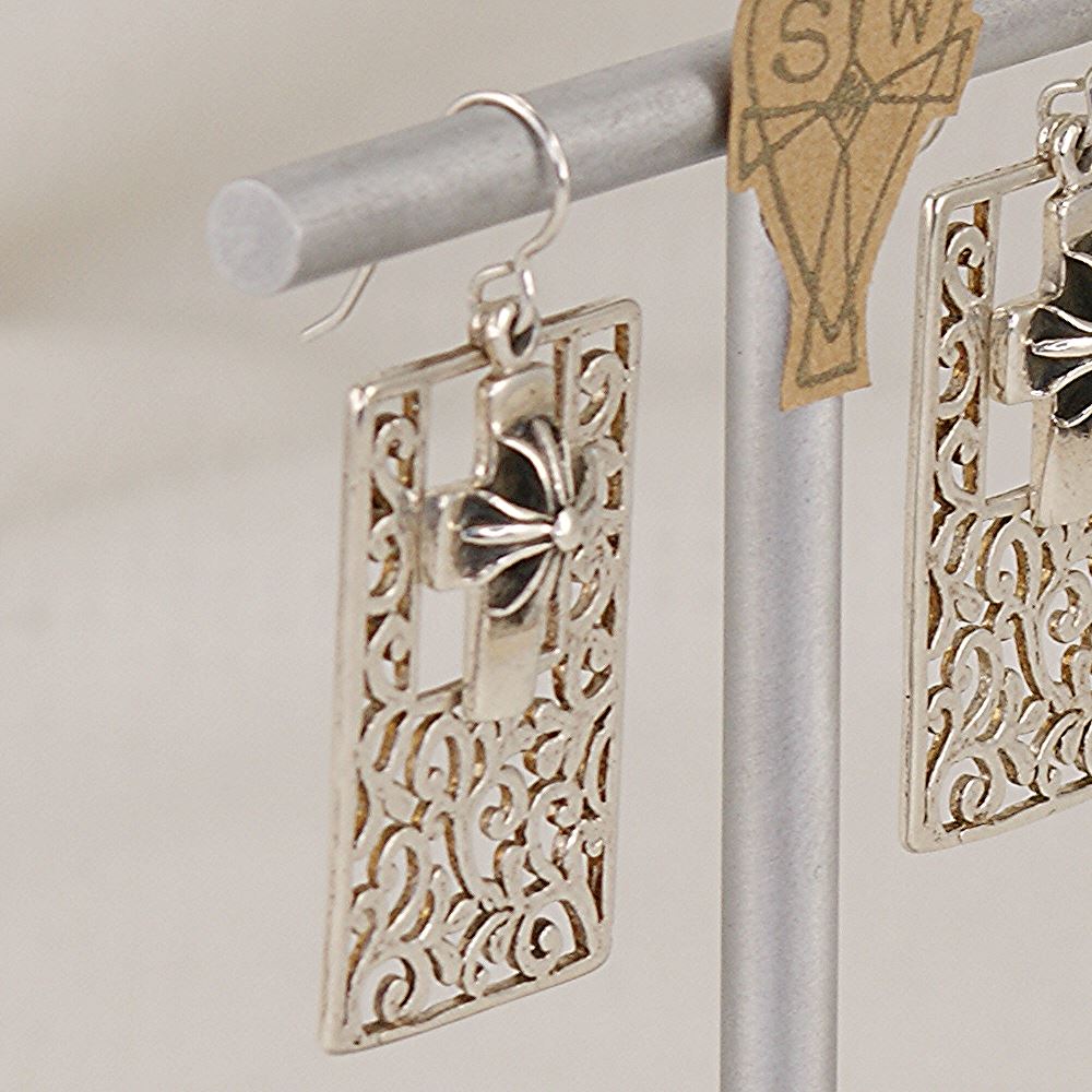 Earrings handmade from scroll cut 925 sterling silver and 3D crosses.
