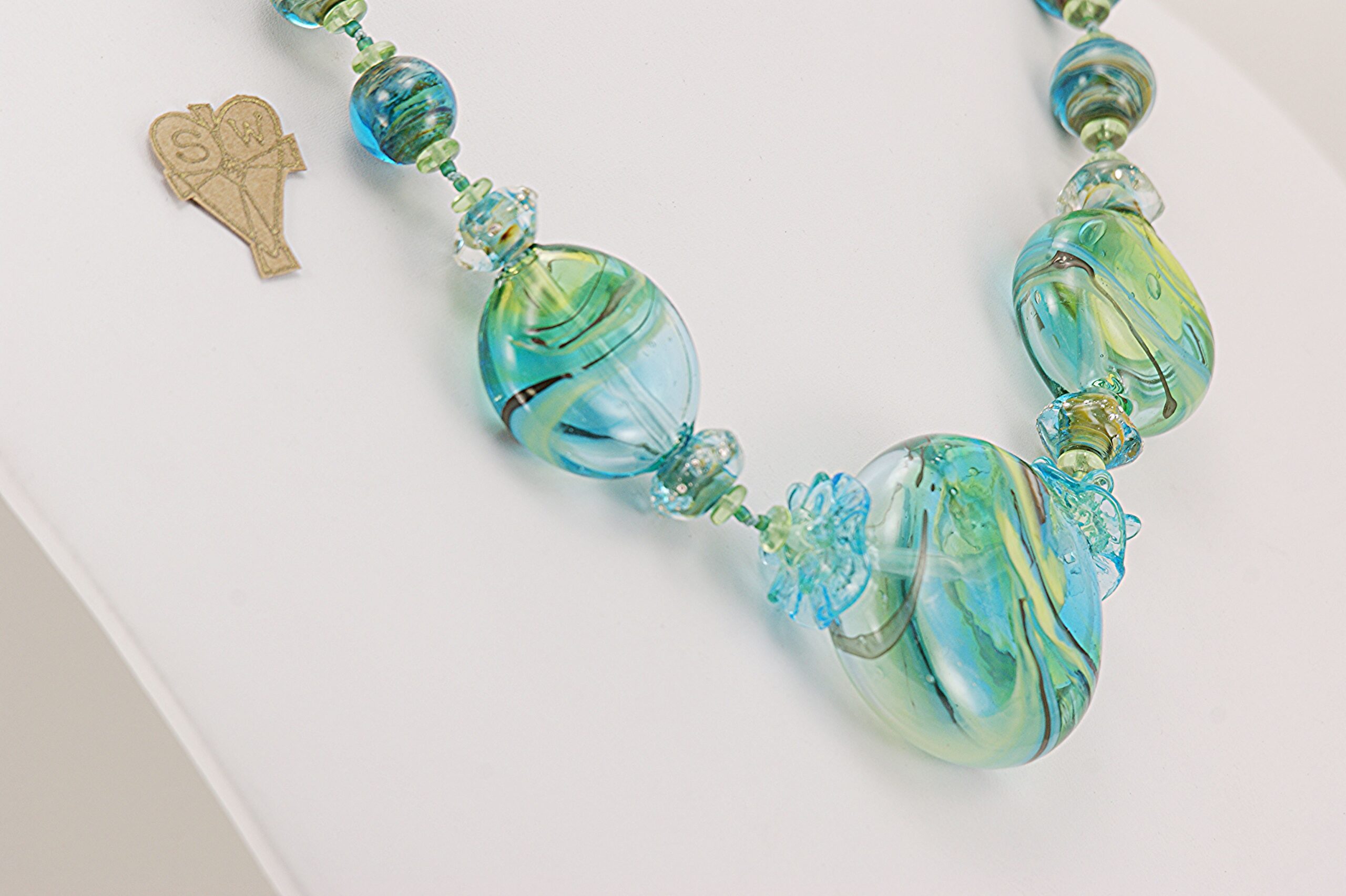 handmade blue green glass bead necklace with silver accents