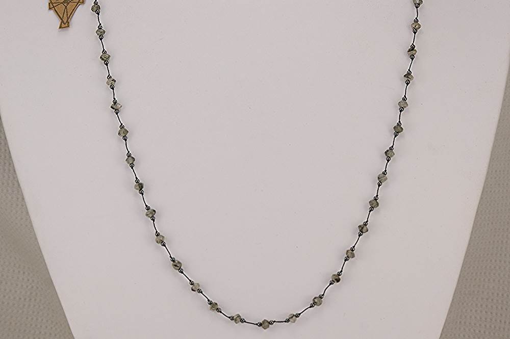 Smokey, faceted, rutilated, quartz necklace with hematite micro beads.
