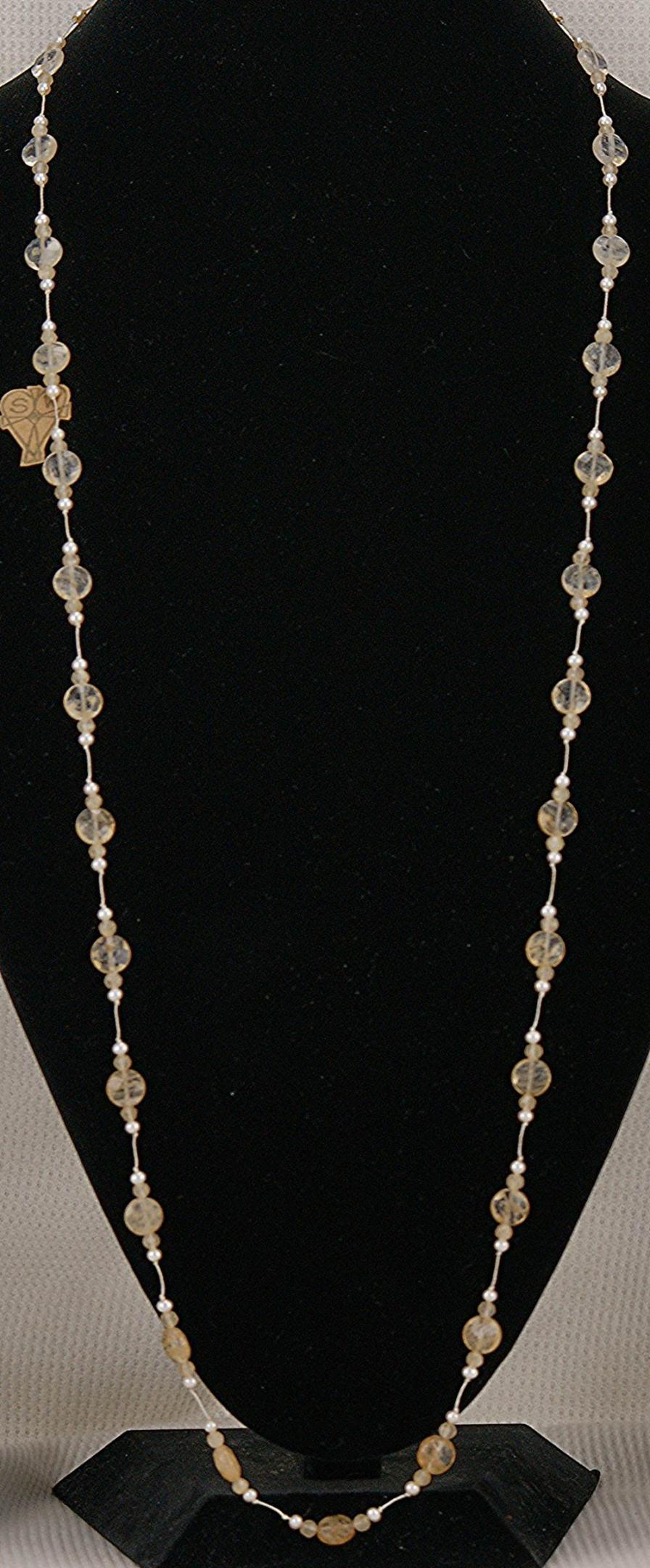 44 inch long, rutilated, quartz and pearl necklace.
