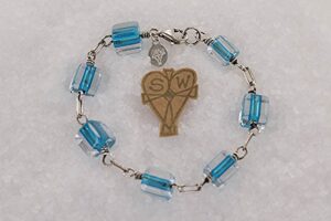 Turquoise colored quartz crystal glass bead necklace with sterling silver.