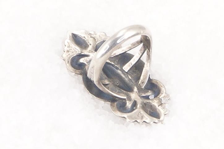 Handmade silver vintage Navajo repouss'e ring.