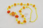 Handmade bright orange and yellow glass bead necklace.