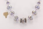 Lavender, violet, heffalump, colored glass bead necklace with sterling silver overlay.