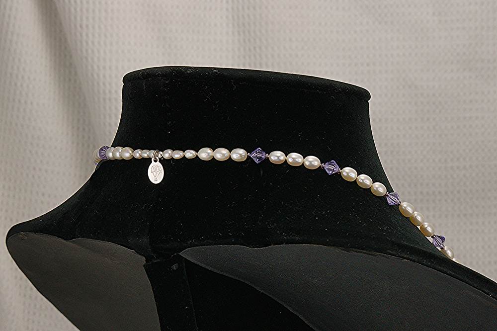 Handmade, pearls necklace with amethyst Swarovski crystals.