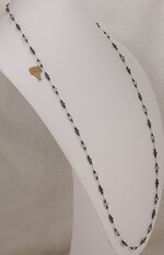 Smokey and clear rutilated quartz, 42 inch long necklace with hematite and black spinel beads.