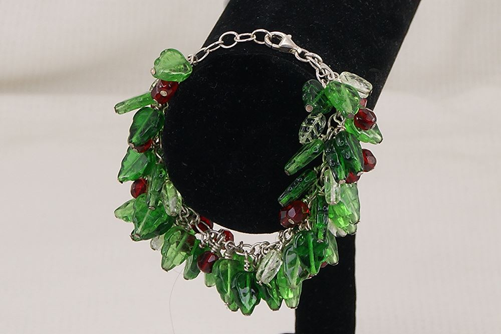 One of a kind green and red glass bead bracelet.