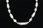 White and beige glass bead necklace with citrine faceted stones.