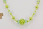 Handmade , spring green and teal colored glass bead necklace.