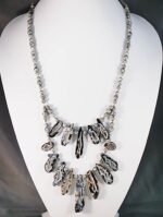 Hand cut gray lace agate geode necklace with faceted agate beads