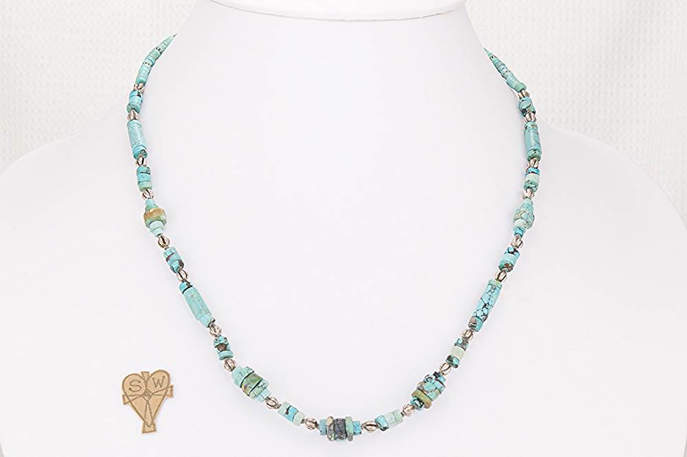 Necklace handmade with old turquoise and sterling silver beads.