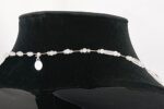 Necklace made of naturally faceted, raw, quartz, rock, crystal, with moonstone beads.