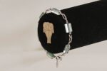 Hand blown, ceylon green glass beaded bracelet with sterling silver.