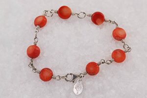 Persimmon colored, bamboo coral beaded bracelet with sterling silver.