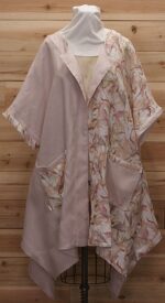 Light pink and mauve flowered print Australian linen cloak with two large front pockets.