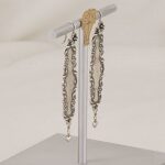 Sterling silver Victorian spoon handle earrings with dangling hearts.