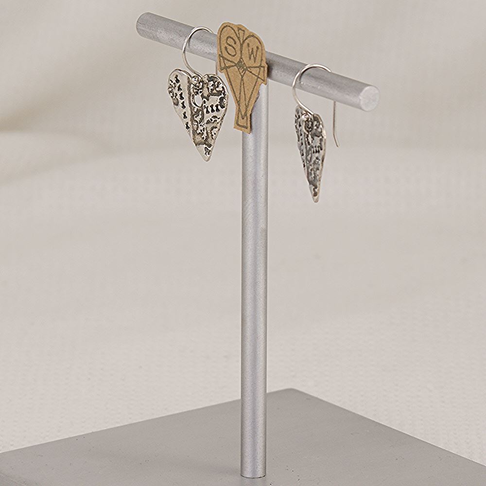 Handmade sterling silver artistic imprinted earrings.
