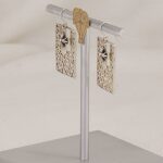 Handmade sterling silver flat cut out scroll worked earrings.