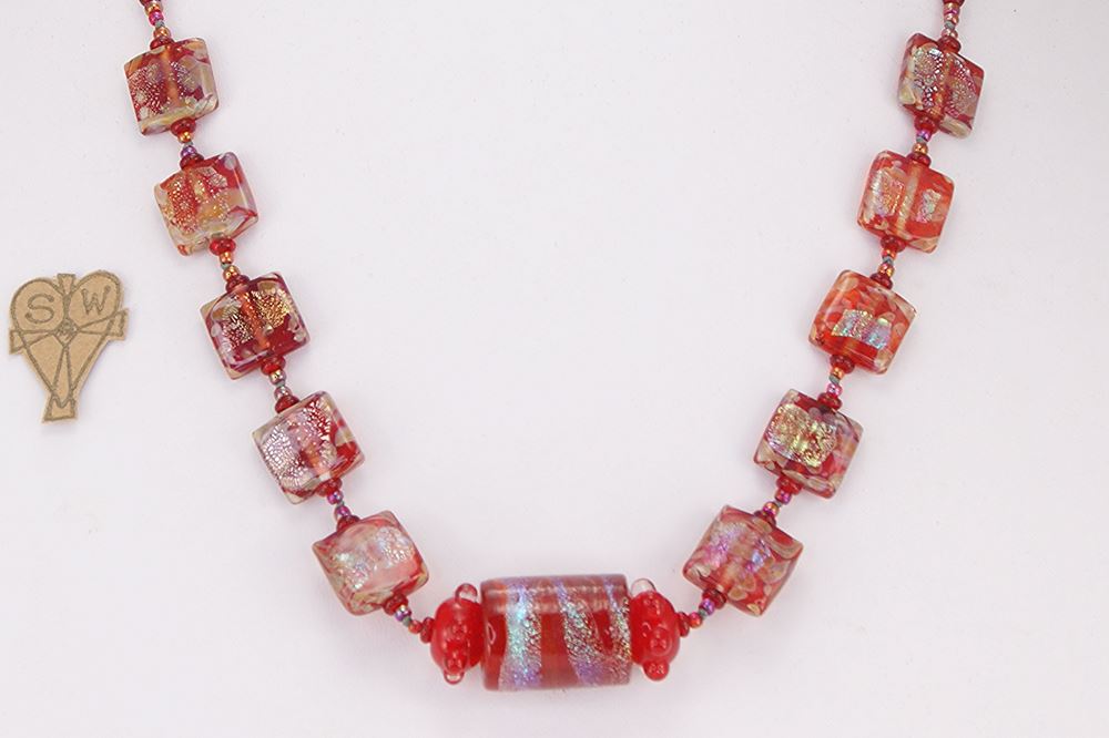 Eye catching red Murano and dichroic glass bead necklace.