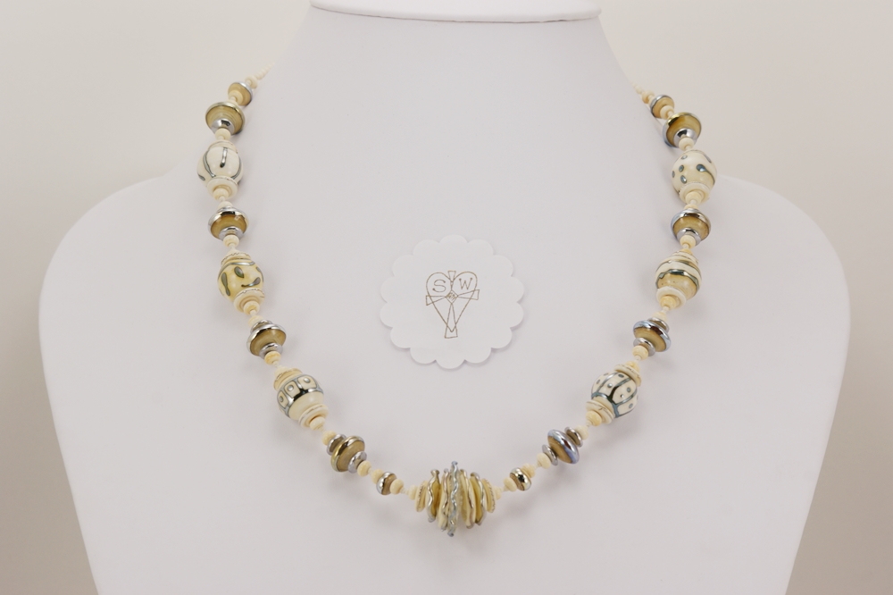 necklace with ivory colored sterling silver highlighted glass beads