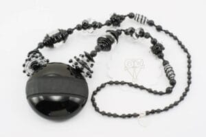 necklace with deep black and crystal clear glass beads