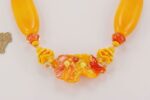 necklace with bright orange yellow glass beads