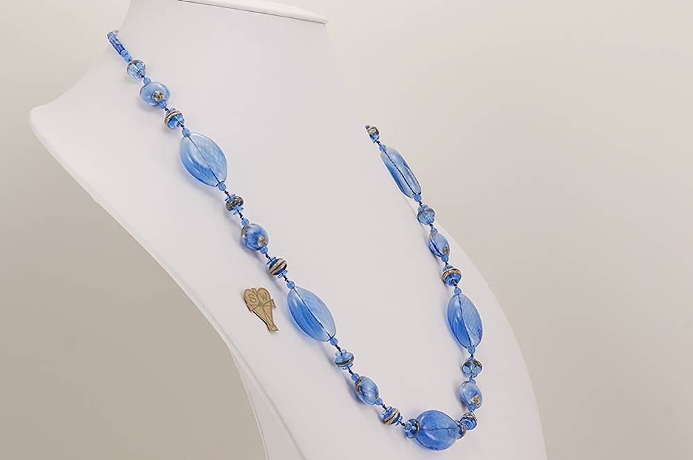 Cobalt colored glass beaded necklace with sterling silver effect accents.