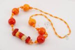 Fiery orange glass bead necklace.