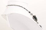Necklace with handmade black and sterling silver accented glass beads.