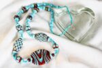 Red and turquoise beaded necklace.