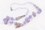 Purple violet glass bead necklace with amethyst rondelles accented with gold and silver.