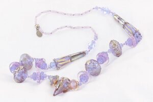 Purple violet glass bead necklace with amethyst rondelles accented with gold and silver.