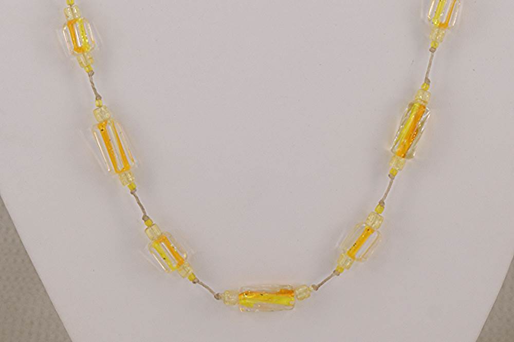 Bright yellow and orange glass bead necklace with hand blown Austrian beads.