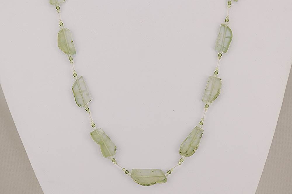 Necklace made of semi precious , raw, chrysolite and peridot beads.