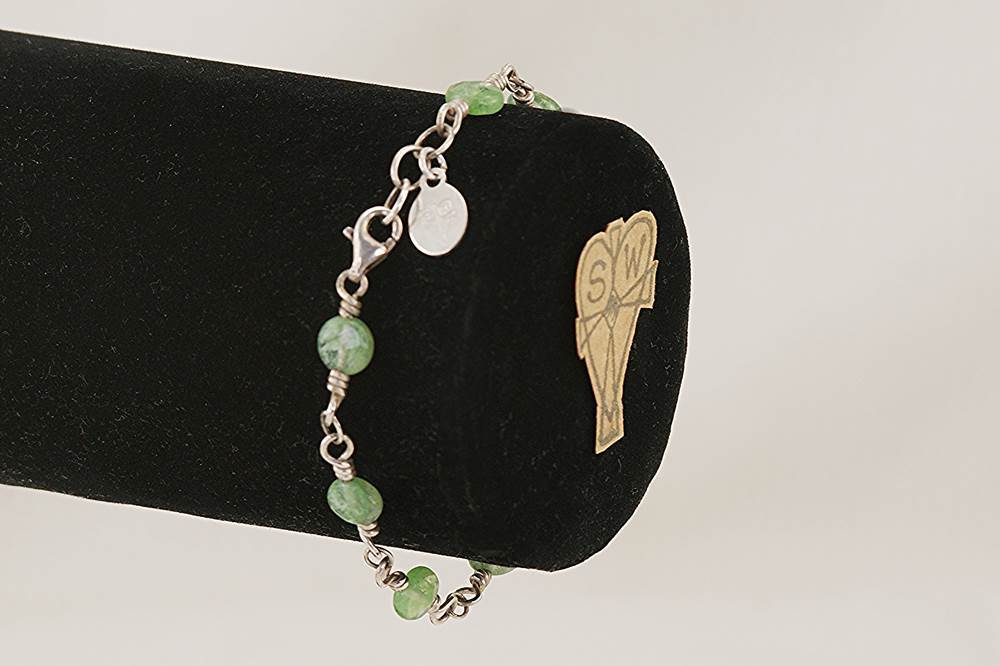 Sterling silver and green rutile quartz beaded necklace.