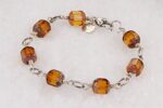 Topaz colored glass bead bracelet with sterling silver.
