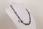 Handmade cobalt blue and sterling silver glass bead necklace.