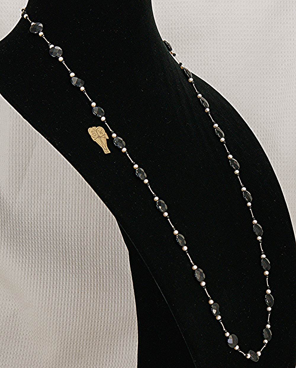 35 inch long, faceted, black spinel and freshwater pearl necklace.