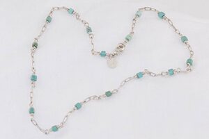 Handmade necklace with turquoise and silver.