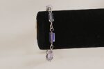 One of a kind, handmade, lavender, glass bead bracelet with sterling silver.