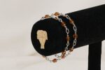 2 bracelet set made with copper colored glass beads and sterling silver.
