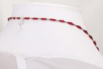 Necklace made of beautiful red glass beads with sterling silver accents.