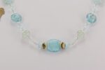 blue clear colored bead necklace