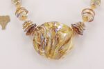 necklace with golden glass sterling silver accented hollow beads