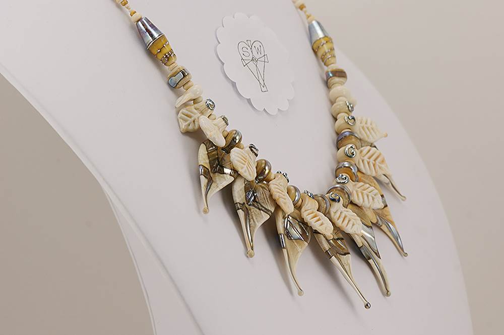 Handmade ivory and sterling silver colored glass bead necklace