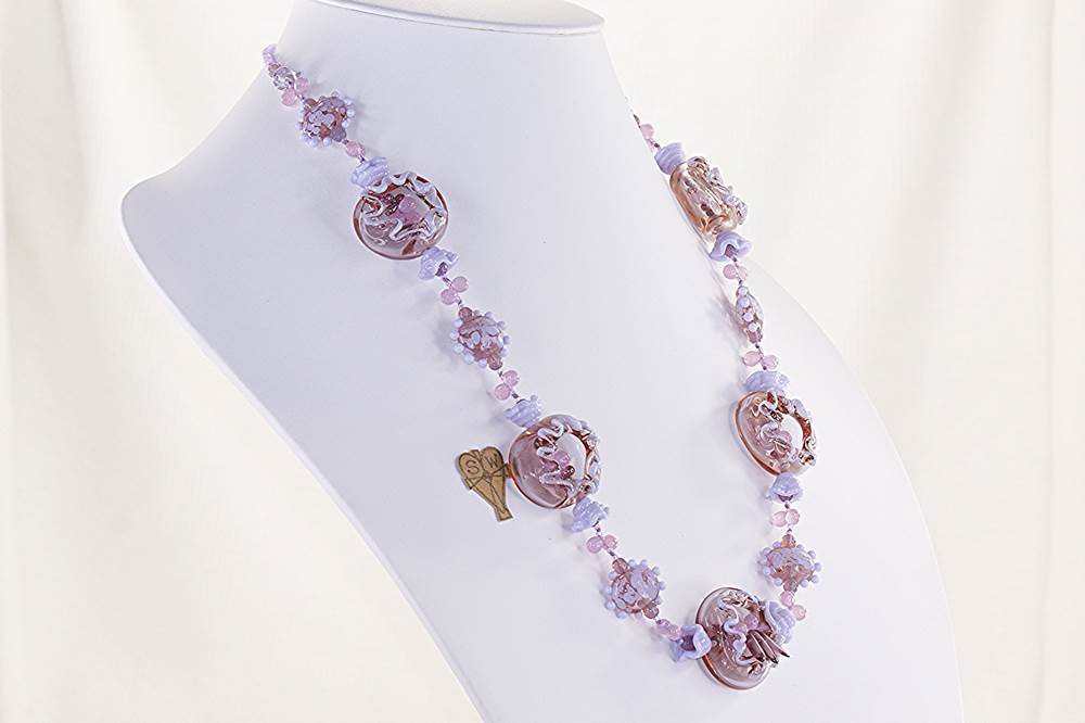 Sea anemone necklace with lavender glass beads.
