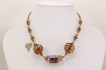 necklace made with copper bronze and silver colored glass beads