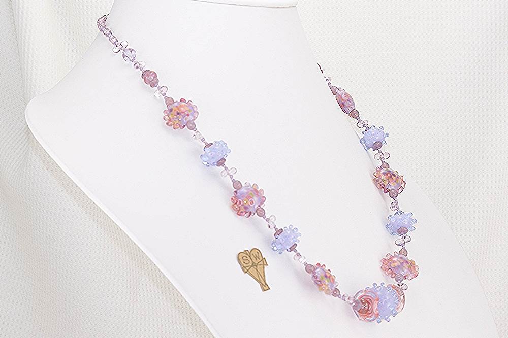 Pink and light lavender glass beaded necklace.